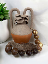 Load image into Gallery viewer, Two-Tone Brazilian Vase with Sculpted Lid, Tassel, and Gilded Beads

