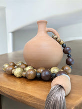 Load image into Gallery viewer, Natural Brazilian Clay Vase with Gilded Bead Strand and Tassel
