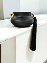 Load image into Gallery viewer, Black Brazilian Clay Vase with Gold Leaf and Silk Tassels
